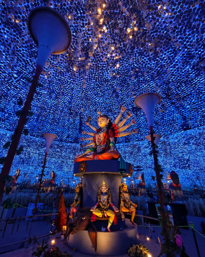 Durga Puja pandal decorated with blue lights